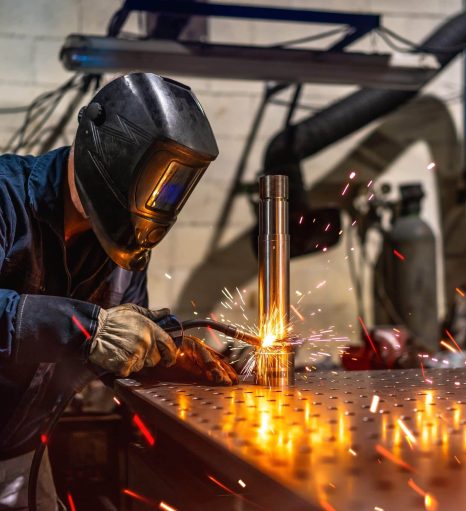 welder-welding-a-piece-of-metal-in-a-factory-2026-01-06-10-17-41-utc
